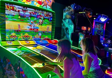 What is a game arcade machine?